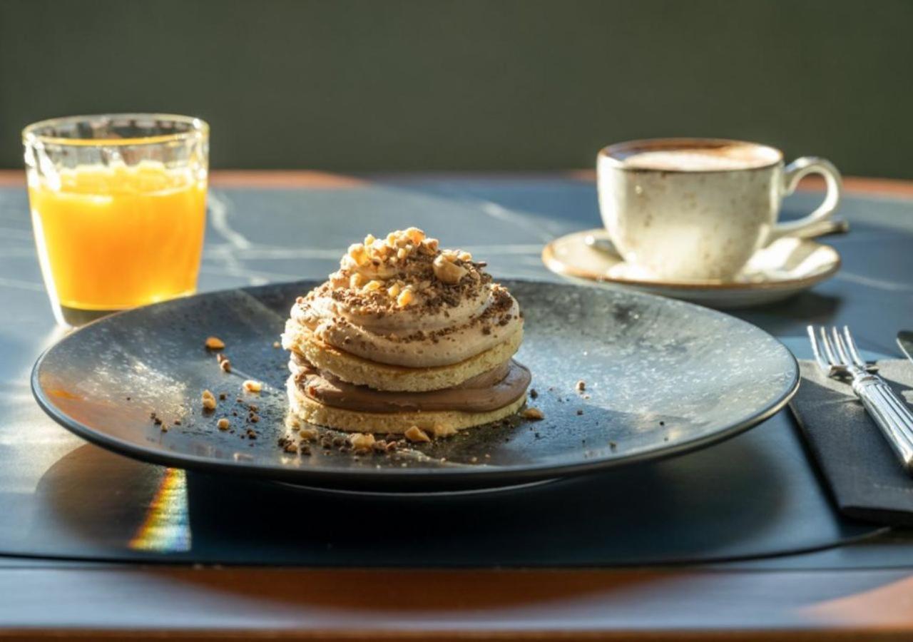 Only You Hotel Valencia Exterior photo A chocolate and orange mousse