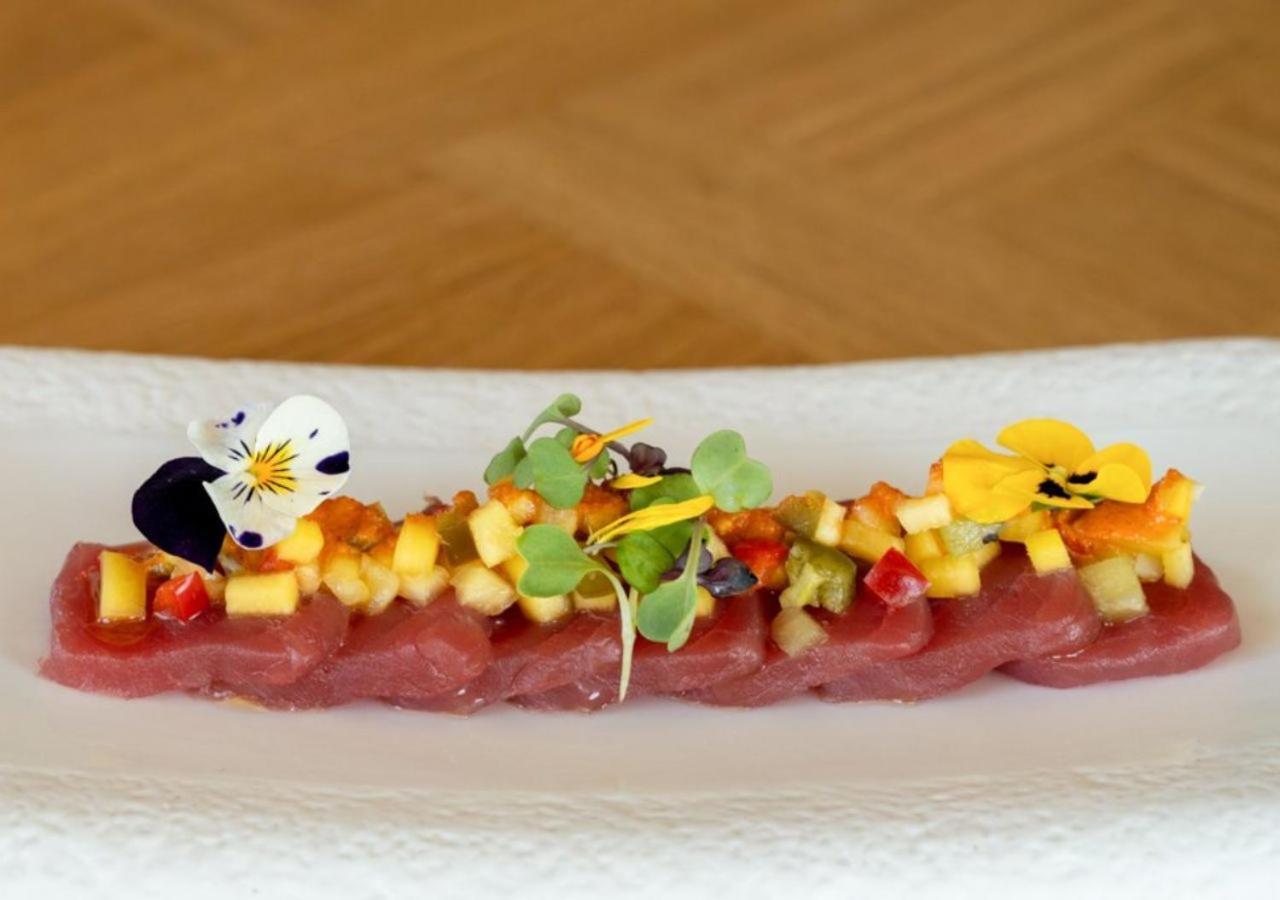Only You Hotel Valencia Exterior photo A dish of edible flowers